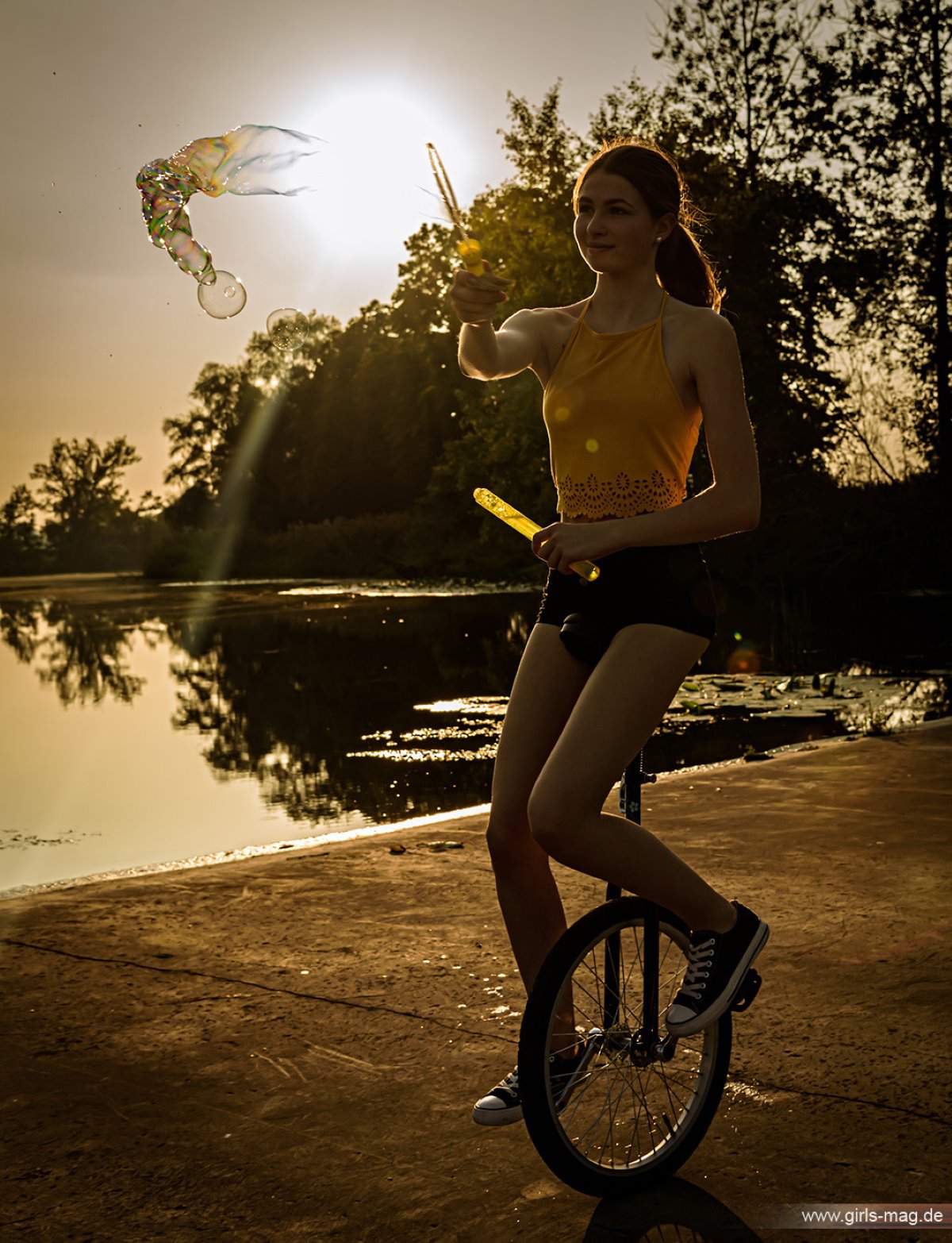 Girls Mag Annika Bubbles on a Unicycle 0127 4896357033.jpg